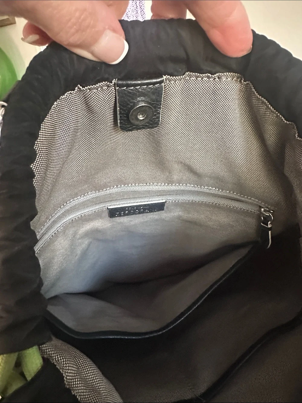 Cole Haan Zerogrand Convertible Nylon Backpack Tote in black with lime green